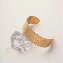 Load image into Gallery viewer, Sleek, modern, and effortlessly stylish, this wide-face open bangle is a must-have accessory for any jewelry collection. Crafted from high-quality stainless steel, it’s waterproof, durable, and designed for all-day comfort. With its smooth, minimalist design, this bracelet adds a touch of elegance to any outfit—perfect for everyday wear or as a thoughtful gift!