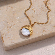 Load image into Gallery viewer, This elegant semi-baroque freshwater-wave pearl pendant necklace is made out of 18K gold plated stainless steel. It can be combined with an elegant dinning or celebration outfit and it can be a perfect gift for a special one.