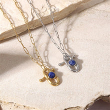 Load image into Gallery viewer, This circle hollow pendant necklace is made out of 18K gold plated stainless steel and it is adorned with cubic zirconia. It is a perfect piece for an elegant occasion outfit. The necklace has a size adjustable chain with a lobster clasp.