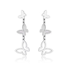 Load image into Gallery viewer, Elegant stainless steel earrings are made in a rose gold and silver colour. They consists of three connected butterflies. Butterflies are connected from the smallest one to the biggest. The smallest one has shiny rose gold surface, the middle one is adorned with white shell and the biggest one represents only butterfly silhouette. Earrings are rose gold plated and represent perfect and elegant touch to your evening outfit. They have stud fastening.