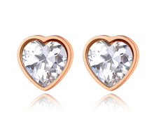 Load image into Gallery viewer, Classy and elegant stainless steel earrings are made in a rose gold and silver colour. The earrings are made in a shape of a heart which is adorned with big cubic zirconia. Earrings are rose gold plated and represent perfect and elegant touch to your classy and smart outfit. They have stud fastening.