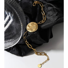 Load image into Gallery viewer, Bracelet is made of stainless steel and has real gold plating. Its link chain is adorned with medallion. Medallion has engraved sun, moon and little stars. The bracelet has adjustable length and lobster closer. It is perfect for everyday occasions.