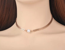Load image into Gallery viewer, Bohemian stainless steel necklace is coming in rose gold colour and is three times gold plated. It is made of delicate and beautiful chain with links in a shape of leaves. In the bottom it is adorned with white artificial pearl. It makes great accessory for your daily and evening outfits.
