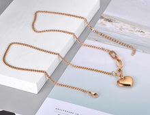 Load image into Gallery viewer, Bohemian necklace is made of stainless steel that is three times gold plated. It is made of link chain. At the bottom of a necklace links are much bigger at one side and makes the whole necklace very interesting. The necklace has a pedant in a shape of a heart which makes this necklace a perfect gift for your loved ones.