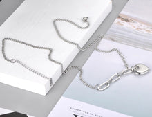 Load image into Gallery viewer, Bohemian necklace is made of stainless steel that is three times gold plated. It is made of link chain. At the bottom of a necklace links are much bigger at one side and makes the whole necklace very interesting. The necklace has a pedant in a shape of a heart which makes this necklace a perfect gift for your loved ones.