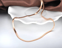 Load image into Gallery viewer, Stainless steel necklace comes in a rose gold, gold and silver colour. It is made of fine thin snake chain. This simple necklace is perfect for daily outfits as well as to light up your night combination. It has adjustable length with lobster clasp. The adjustable chain is adorned with a little pedant in a shape of a heart.