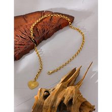 Load image into Gallery viewer, Stainless steel necklace comes in a gold and silver colour. It is three times gold plated. The necklace is made of interesting link chain which is adorned with a heart pedant. Heart pedant is engraved with lines which makes the necklace even more adorable. It has lobster clasp which can be connected to any link on a chain so you can wear the necklace in several ways.
