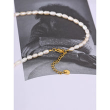 Load image into Gallery viewer, Natural pearl necklace comes in a white colour. It is made of natural pearls and it is adorned with a moon pedant. Moon is made of stainless steel and comes in a gold colour. The pedant is three times gold plated. This necklace is perfect for elegant evening outfit. It has adjustable length and lobster clasp.