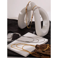 Load image into Gallery viewer, Stainless steel necklace with real gold plating comes in a gold and silver colour. It is made of a fine snake chain and it is made in three layers. Layers has different length. This snake chain necklace is perfect for glamming up your evening combination. It has lobster clasp.