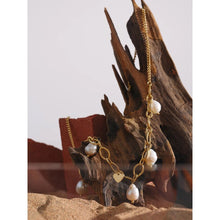 Load image into Gallery viewer, Necklace is made of stainless steel and comes in a gold colour with real gold plating. It is made of a thin and elegant chain that transfers into a link chain at its bottom. The link part is adorned with natural pearls and little heart in gold colour. This elegant necklace is perfect for your evening outfit. it has adjustable length and lobster clasp.