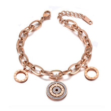 Load image into Gallery viewer, Beautiful stainless steel bracelet is made of a big linked chain and adorned with three circles. Main circle is richly adorned with two circles of cubic zirconia and engraved roman numerals. Other two circles are smaller and have roman numerals around its perimeter. The length is adjustable and bracelet has lobster closure.
