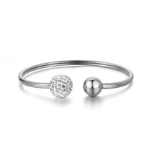 Load image into Gallery viewer, Luxurious bangle bracelet is made of stainless steel and comes in two colours: rose gold and silver. It is richly adorned with two balls. One ball is decorated with cubic zirconia while the other is the same colour as the bangle, rose gold or silver. Cubic zirconia comes in two variants: black and white. This bracelet makes perfect accessory for your evening night out.