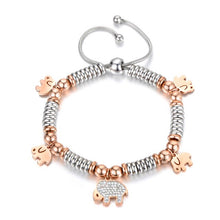 Load image into Gallery viewer, Stainless steel bracelet comes in a combination of two colours: rose gold and silver. It is made of beads in two different colours and additionally adorned with 5 pedants. Pedants come in four shapes: star, heart, butterfly or elephant. Four pedants on a bracelet are smaller in rose gold colour and one is bigger, richly adorned with cubic zirconia. The length is adjustable with a lace up closure.