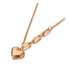 Load image into Gallery viewer, Bohemian necklace is made of stainless steel that is three times gold plated. It is made of link chain. At the bottom of a necklace links are much bigger at one side and makes the whole necklace very interesting. The necklace has a pedant in a shape of a heart which makes this necklace a perfect gift for your loved ones.