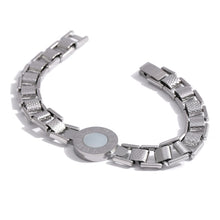 Load image into Gallery viewer, Bracelet is made of stainless steel and has real gold plating. It comes in two colours: gold and silver. It is adorned with a shell plate circled by engraved roman numerals. It has watch clasp and it is a perfect accessory for your smart outfit.