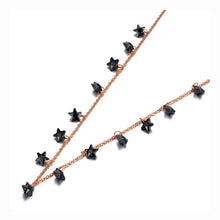 Load image into Gallery viewer, Stainless steel necklace comes in a rose gold and silver colour. it is three times gold plated. The necklace is made of fine thin chain which is adorned with fourteen little pedants in a shape of a star. Star pedants are made in black colour. This elegant bohemian necklace is perfect to spice up any outfit. It has lobster clasp.