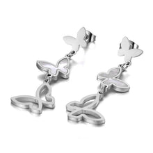 Load image into Gallery viewer, Elegant stainless steel earrings are made in a rose gold and silver colour. They consists of three connected butterflies. Butterflies are connected from the smallest one to the biggest. The smallest one has shiny rose gold surface, the middle one is adorned with white shell and the biggest one represents only butterfly silhouette. Earrings are rose gold plated and represent perfect and elegant touch to your evening outfit. They have stud fastening.