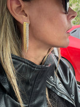 Load image into Gallery viewer, Add a touch of effortless elegance to your everyday look with these zircon chain tassel earrings. Crafted from high-quality stainless steel, they feature shimmering zircon accents and delicate chain tassels that move beautifully with every step. Designed for modern women who love refined, high-end style, these earrings are lightweight, durable, and perfect for daily wear or special occasions. A timeless fashion accessory and a thoughtful gift, they bring sophistication and sparkle to any outfit.
