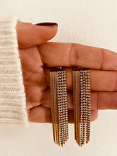 Load image into Gallery viewer, Add a touch of effortless elegance to your everyday look with these zircon chain tassel earrings. Crafted from high-quality stainless steel, they feature shimmering zircon accents and delicate chain tassels that move beautifully with every step. Designed for modern women who love refined, high-end style, these earrings are lightweight, durable, and perfect for daily wear or special occasions. A timeless fashion accessory and a thoughtful gift, they bring sophistication and sparkle to any outfit.
