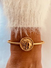 Load image into Gallery viewer, Elevate your everyday style with this classic portrait cuff bracelet, designed for women who love minimalist elegance. Crafted from durable stainless steel with a luxurious 18K gold-plated finish, this open bangle features a timeless portrait design that adds subtle sophistication to any look. Perfect for daily wear or special occasions, it’s a refined fashion accessory and a thoughtful gift with lasting shine.
