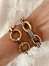Load image into Gallery viewer, Gold and silver chain bracelets on a wrist with a neutral background
