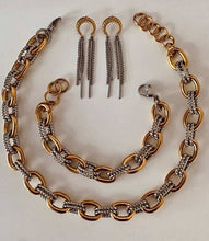 Load image into Gallery viewer, Gold and silver chain necklace with matching earrings on a white background
