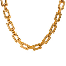 Load image into Gallery viewer, This statement necklace is made of 18K gold plated stainless steel. It comes in two colours, gold and silver. Necklace is made of heavy link chain which makes it a perfect accessory for any evening glam outfit. The necklace has link clasp.&nbsp;
