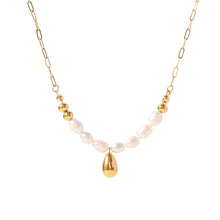 Load image into Gallery viewer, Stainless steel necklace is made as an interesting combination of chain and gold and white pearls. It is additionally adorned with a gold pendant in a shape of a teardrop.&nbsp; This beautiful and charming necklace is a great accessory for evening night out. The necklace has a lobster clasp and adjustable length.
