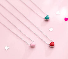 Load image into Gallery viewer, This beautiful and elegant necklace is made of 925 sterling silver. It comes in three variants: pink, red and green. It has very delicate chain and simple pendant which makes this necklace a. perfect accessories for an elegant occasion outfit. The necklace has an adjustable chain with a lobster clasp.
