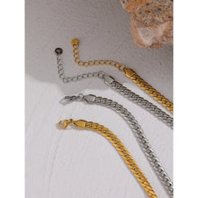 Load image into Gallery viewer, Stainless steel 18K gold plated necklace comes in a gold and silver colour. It is made of a thick and big chain which is adorned with a heart contour in the middle. This luxurious necklace is perfect accessory for any evening gown. It has lobster clasp and adjustable length.
