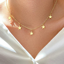 Load image into Gallery viewer, Stainless steel necklace comes in a gold and silver colour. It is made of a nice thin chain which is adorned with 5 charms in a shape of a star. This chain necklace is very nice accessory for a daily outfit. It has lobster clasp and adjustable length.
