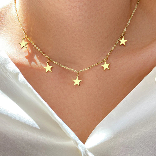 Stainless steel necklace comes in a gold and silver colour. It is made of a nice thin chain which is adorned with 5 charms in a shape of a star. This chain necklace is very nice accessory for a daily outfit. It has lobster clasp and adjustable length.