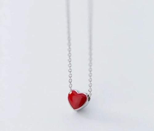 This beautiful and elegant necklace is made of 925 sterling silver. It comes in three variants: pink, red and green. It has very delicate chain and simple pendant which makes this necklace a. perfect accessories for an elegant occasion outfit. The necklace has an adjustable chain with a lobster clasp.