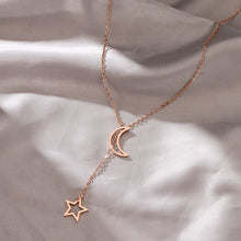 Load image into Gallery viewer, Stainless steel necklace comes in a gold, silver and rose gold colour. It is made of a nice thin chain which is adorned on each end with one silhouette charm: moon and a star. This chain necklace is pretty long and it is worn in a way that star pendant should be pulled through the moon pendant. It is a great accessory to any evening outfit but it can easily be combined with daily outfits as well.
