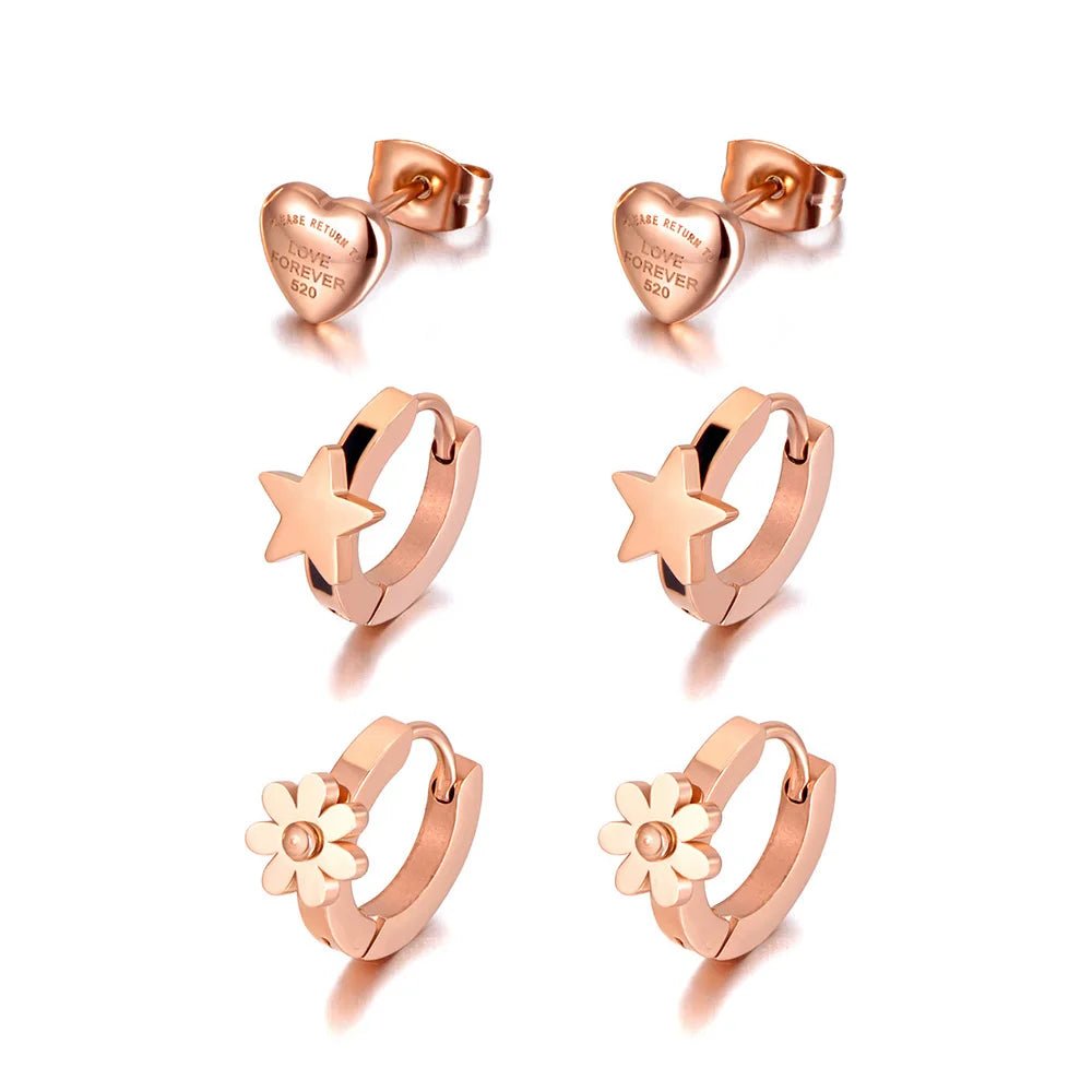 Add a touch of playful elegance to your look with these trendy titanium stainless steel star, heart, and flower charm earrings. This 3-pair set offers versatile designs perfect for any occasion, from casual wear to parties. Crafted for durability and style, these earrings are ideal for women and girls who love charming, eye-catching jewelry that adds a spark of fun to any outfit.