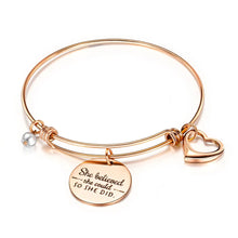 Load image into Gallery viewer, Inspire and empower with this stainless steel creative lettering &quot;She Believed She Could So She Did&quot; charm bangle bracelet. Designed for women and girls who embrace their inner strength, this bohemian-style bracelet features an engraved inspirational message, reminding the wearer of the power of belief and self-love. The sleek stainless steel construction ensures durability and a modern, chic aesthetic that complements any style.
