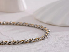 Load image into Gallery viewer, This chain necklace is made of stainless steel. It is made as a combination of silver and gold chain which makes it very interesting and wearable. It is a perfect piece for an everyday outfit as it can be easily combined due to dual colours. The necklace has a size adjustable chain with a lobster clasp.&nbsp;
