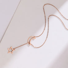 Load image into Gallery viewer, Stainless steel necklace comes in a gold, silver and rose gold colour. It is made of a nice thin chain which is adorned on each end with one silhouette charm: moon and a star. This chain necklace is pretty long and it is worn in a way that star pendant should be pulled through the moon pendant. It is a great accessory to any evening outfit but it can easily be combined with daily outfits as well.
