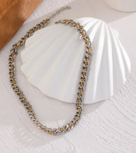 Load image into Gallery viewer, This chain necklace is made of stainless steel. It is made as a combination of silver and gold chain which makes it very interesting and wearable. It is a perfect piece for an everyday outfit as it can be easily combined due to dual colours. The necklace has a size adjustable chain with a lobster clasp.&nbsp;
