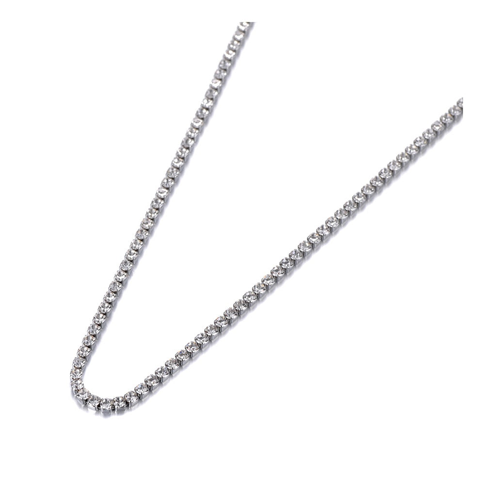 This beautiful tennis necklace is made of stainless steel and comes in three colours: rose gold, gold and silver. It is adorned with cubic zirconia which gives the necklace divine sparkling effect. This necklace is a perfect piece for an elegant occasion outfit. It has a size adjustable chain with a lobster clasp. 