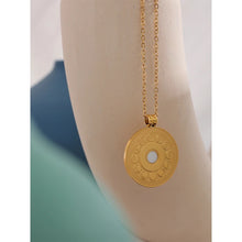 Load image into Gallery viewer, 18K gold plated stainless steel medallion necklace comes in gold colour. Statement medallion is adorned with a bigger cubic zirconia in the middle, and it represents lunar phases. It is a perfect piece for an elegant summer occasion outfit. The necklace has a size adjustable chain with a lobster clasp. 
