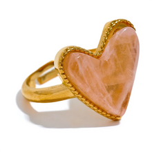 Load image into Gallery viewer, Add a playful touch to your style with this candy sweet natural stone heart open ring. Crafted from stainless steel and plated in real gold, this adjustable ring features a charming heart-shaped natural stone centerpiece, evoking the fun and vibrant energy. Its open design ensures a comfortable, custom fit, making it perfect for everyday wear or as a standout accessory for special occasions.
