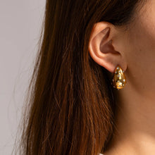 Load image into Gallery viewer, These chic chubby waterdrop stud earrings bring a touch of elegance with their sleek gold and silver color options and embedded zircon accents that add a hint of sparkle. Crafted from durable stainless steel, they’re designed to be both stylish and long-lasting, making them a versatile accessory for any occasion.
