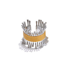 Load image into Gallery viewer, Elevate your style with this unique geometric open ring, featuring a sleek line of sticks elegantly hooped with a golden ring. Crafted from high-quality stainless steel and 18K PVD plated, it offers a luxurious shine and lasting durability. Available in both silver and gold variants, this statement piece adds a modern, chic touch to any outfit, making it a must-have for fashion-forward jewelry lovers.
