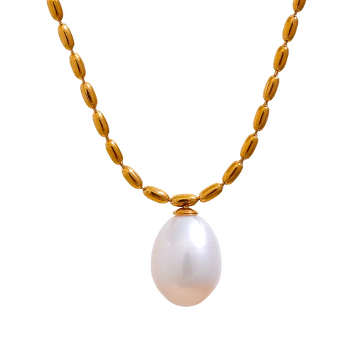 Elevate your style with this stunning gold-colored stainless steel necklace, featuring a uniquely patterned chain that exudes sophistication. Accentuated by a natural freshwater pearl pendant, it’s the perfect accessory for adding a touch of elegance to any glamorous occasion. Designed with both beauty and comfort in mind, it includes a secure lobster clasp and an adjustable chain for a customizable fit. Add this timeless piece to your collection for a refined look that complements any outfit.