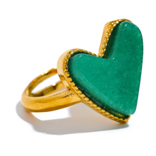 Load image into Gallery viewer, Add a playful touch to your style with this candy sweet natural stone heart open ring. Crafted from stainless steel and plated in real gold, this adjustable ring features a charming heart-shaped natural stone centerpiece, evoking the fun and vibrant energy. Its open design ensures a comfortable, custom fit, making it perfect for everyday wear or as a standout accessory for special occasions.
