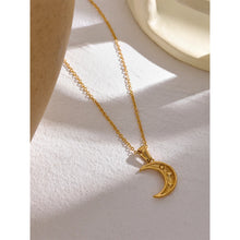 Load image into Gallery viewer, This romantic stainless steel necklace comes in a gold colour. Its has very mice thin chain which is adorned with a nice moon pendant. The moon has several cubic zirconia on its surface which makes it more chic and glamorous. The chain necklace is perfect for spicing up your daily or evening outfit. It has lobster clasp and adjustable length.
