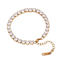 Load image into Gallery viewer, Elevate your style with this luxurious gold plated tennis bracelet, featuring dazzling AAA-grade zircon stones for a radiant sparkle. Crafted from durable stainless steel, this trendy bracelet combines elegance and durability, making it perfect for everyday wear or special occasions. A timeless accessory that adds a touch of sophistication to any outfit, it’s a must-have for any jewelry collection or a thoughtful gift for someone special.
