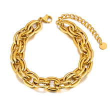 Load image into Gallery viewer, Make a bold statement with this oval circle handmade chain bracelet, meticulously crafted with alternating notched links for added texture and style. Plated in luxurious 18K gold, this stunning piece exudes sophistication and elegance, while the stainless steel construction ensures it remains waterproof and tarnish-free for lasting beauty. Perfect for any occasion, this eye-catching bracelet offers both durability and fashion-forward design, making it a versatile accessory for daily wear or special events.
