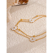 Load image into Gallery viewer, Add a touch of summer romance to your style with this exquisitely crafted gold anklet. Made from high-quality, gold-plated stainless steel, it features a delicate double-chain design. One chain is adorned with dainty gold beads, while the other is beautifully decorated with charming white flowers, creating a perfect balance of elegance and whimsy. With its secure lobster clasp and adjustable length, this anklet is the ideal accessory to enhance your summer look, adding a subtle yet sophisticated touch to yo
